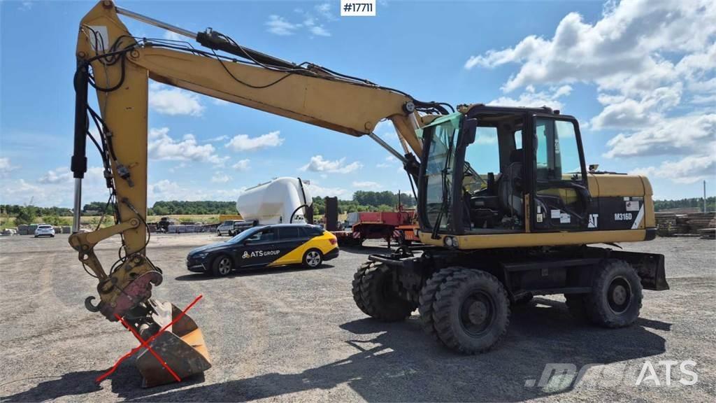 CAT M316D Pelle sur pneus