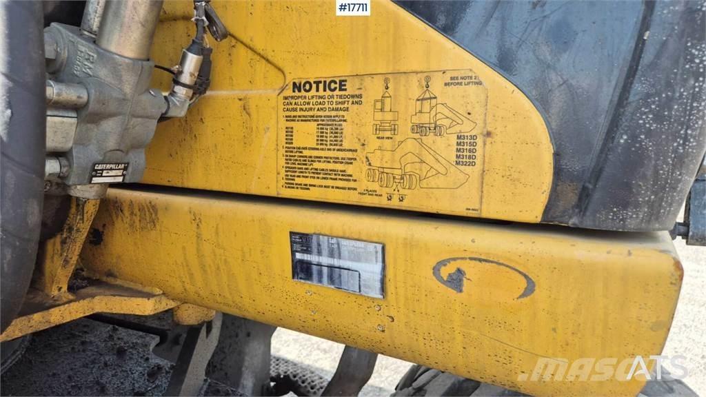 CAT M316D Pelle sur pneus