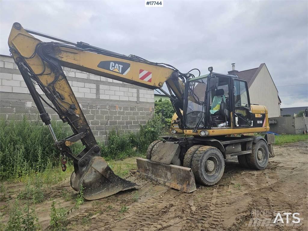 CAT M316D Pelle sur pneus