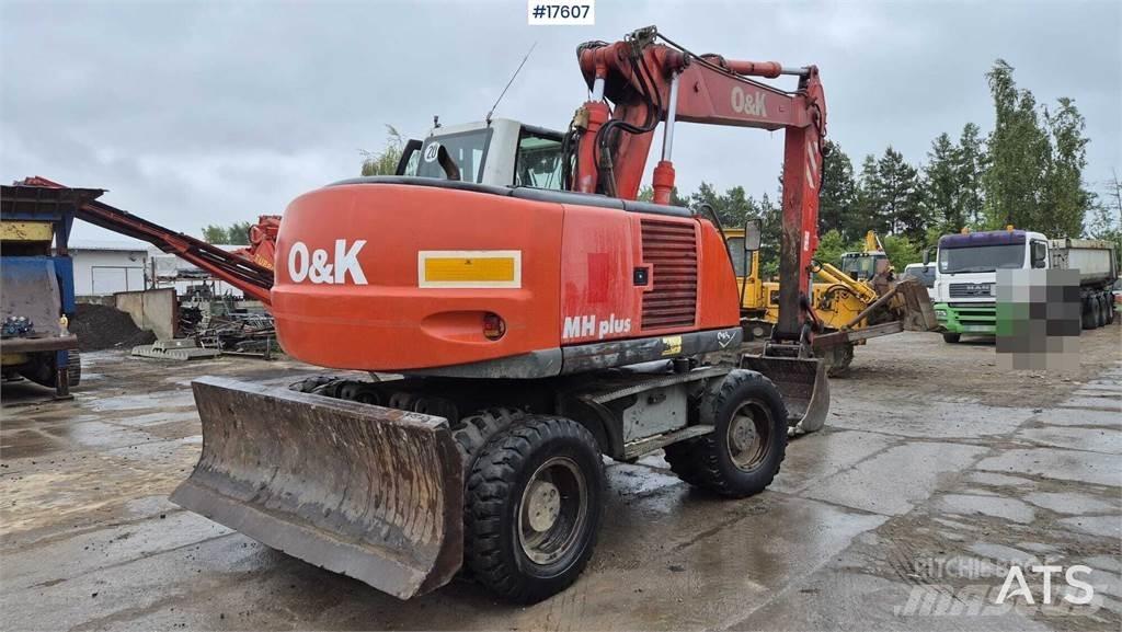 O&K MH PLUS Pelle sur pneus