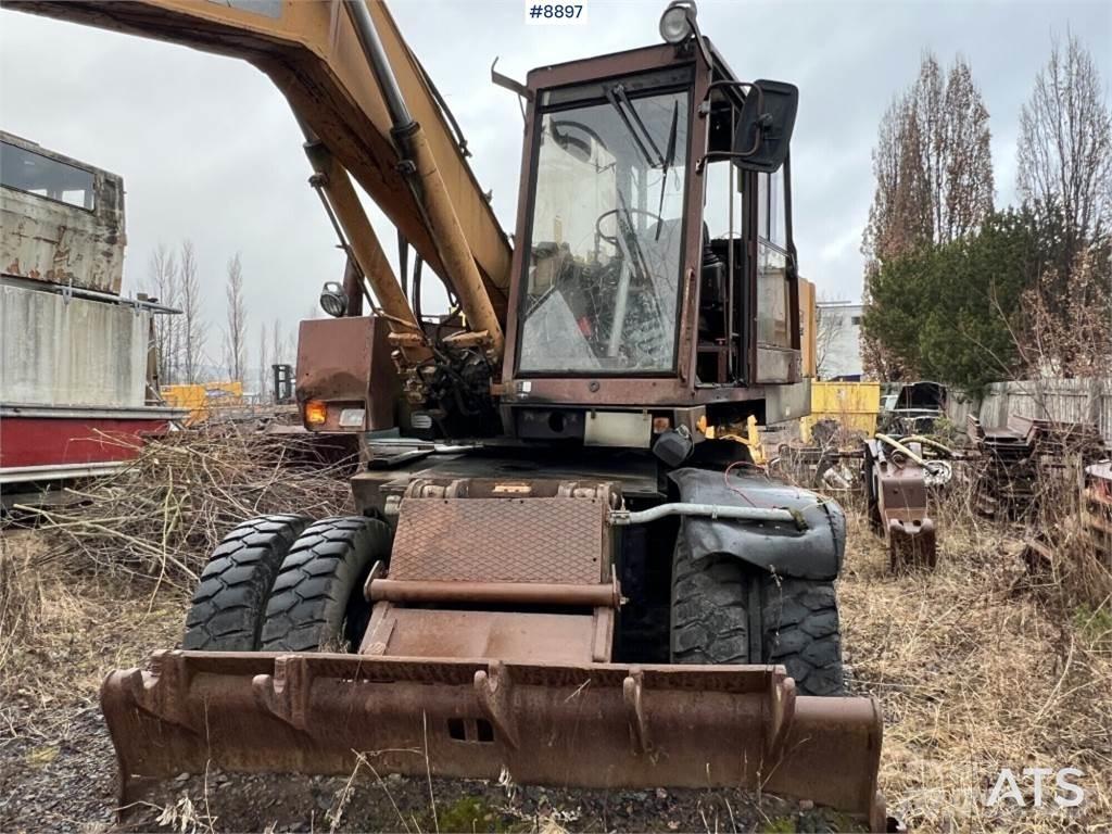 CASE 1088 Pelle sur pneus