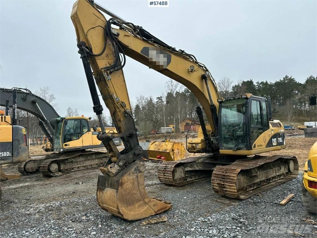CAT 319D Pelle sur chenilles