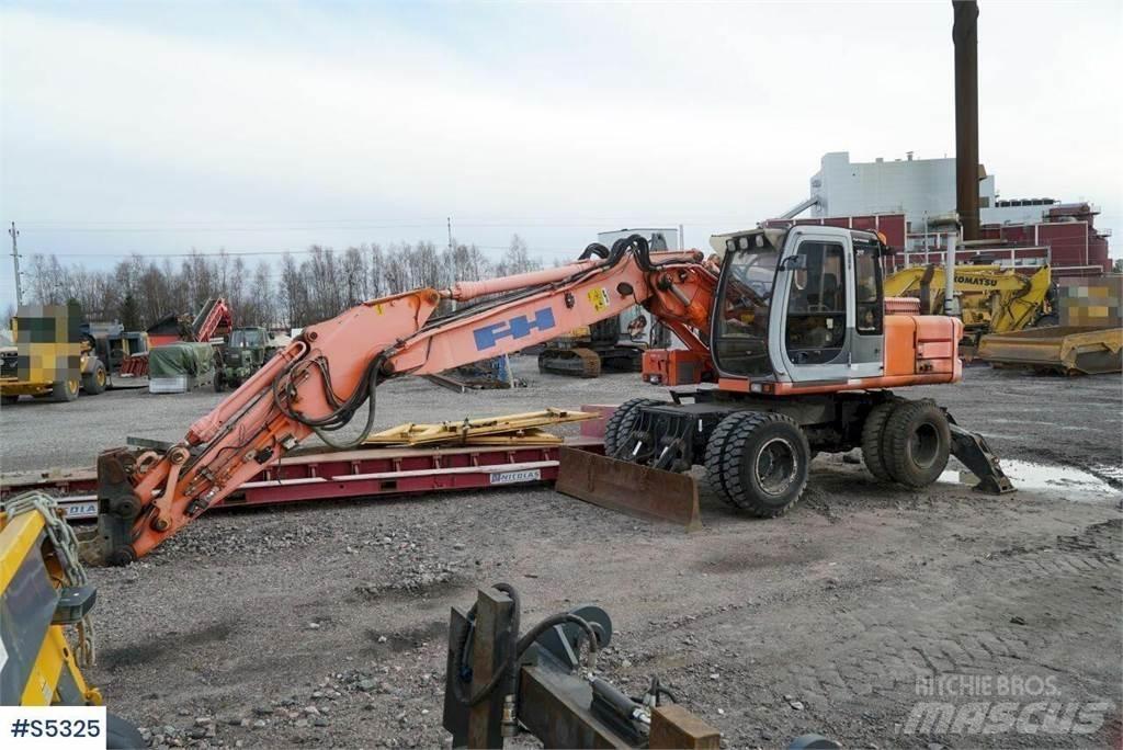 Hitachi EX165W Pelle sur pneus