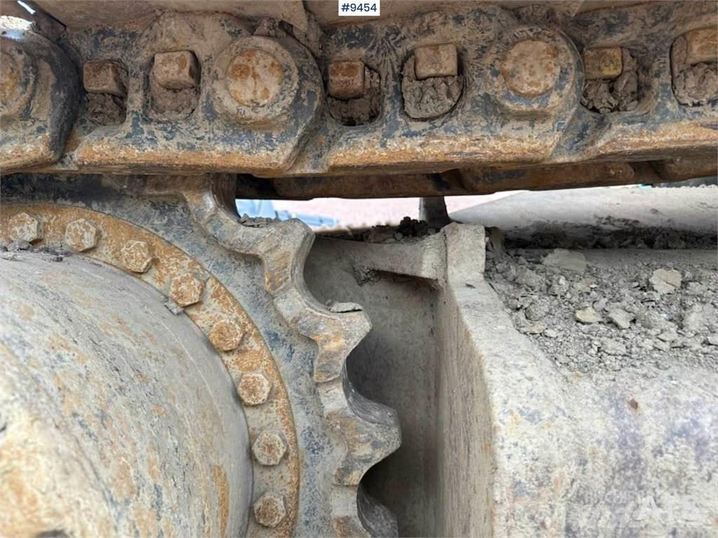 New Holland E385 Pelle sur chenilles