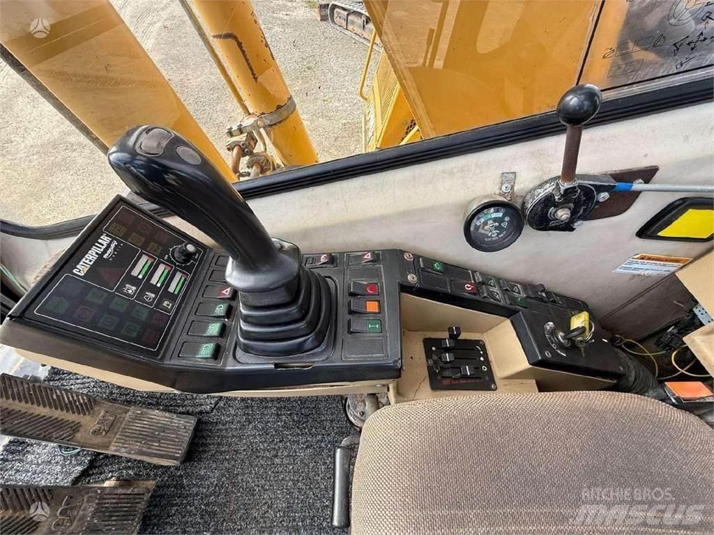 CAT M 315 Pelle sur pneus