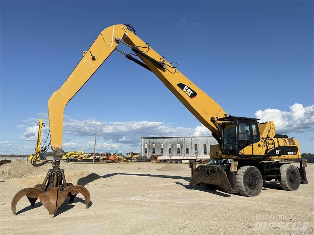 CAT M 325 DLMH Pelle sur pneus