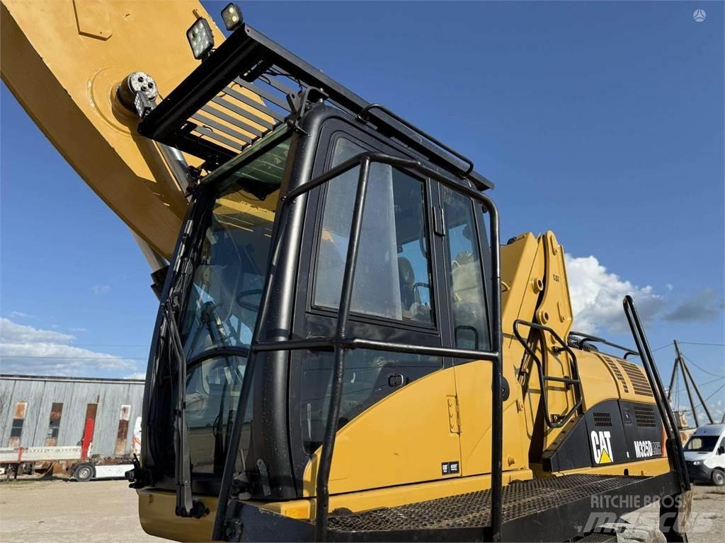 CAT M 325 DLMH Pelle sur pneus