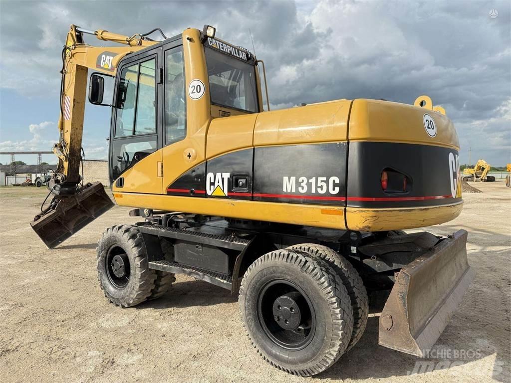 CAT M315C Pelle sur pneus
