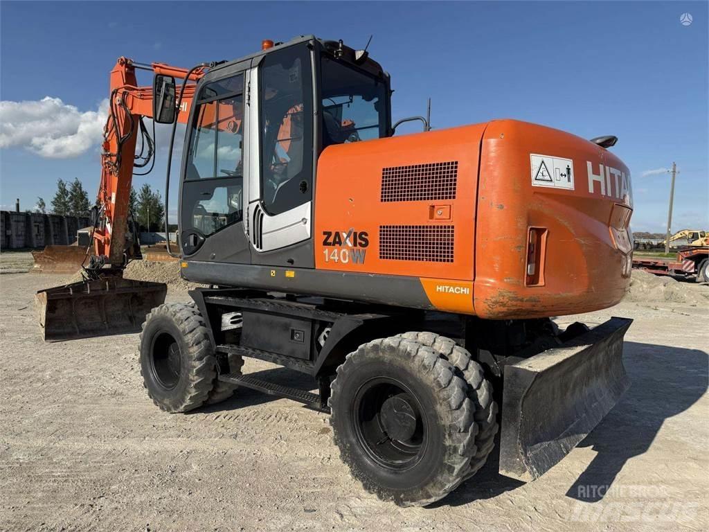 Hitachi ZX 140 W Pelle sur pneus