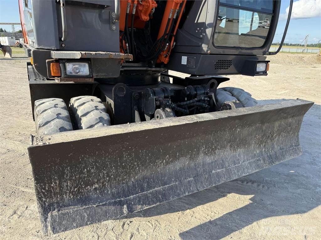 Hitachi ZX 140 W Pelle sur pneus