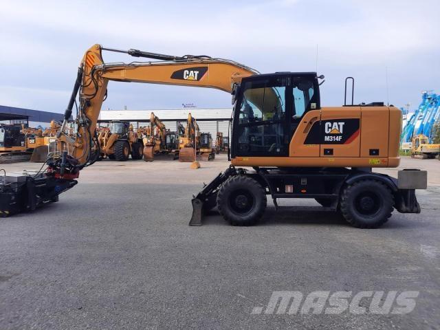 CAT M314F Pelle sur pneus
