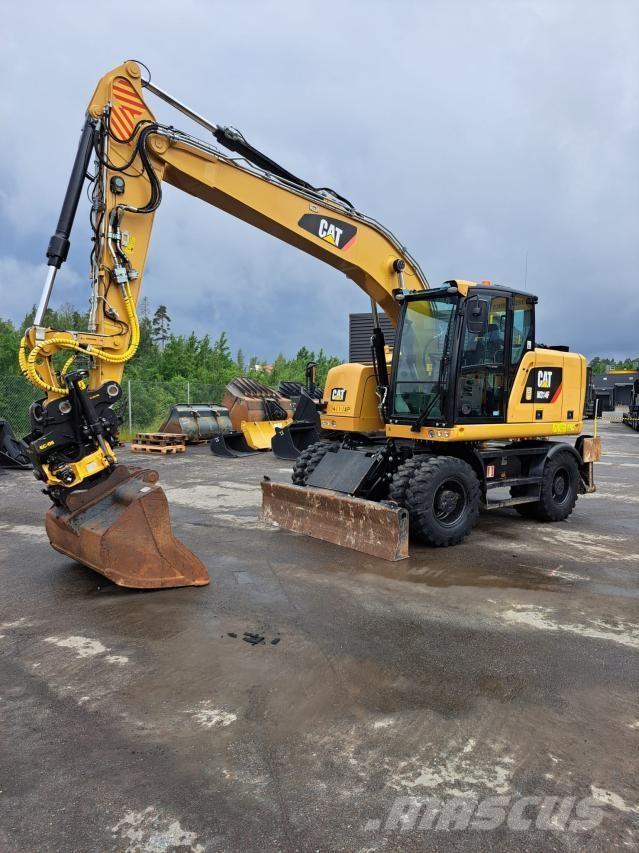 CAT M314F Pelle sur pneus