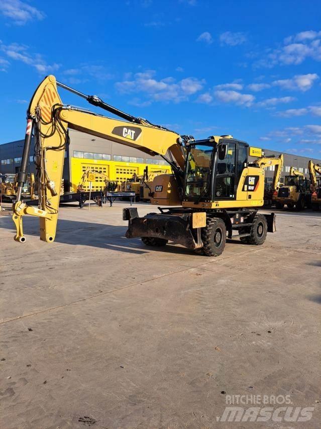 CAT M315F Pelle sur pneus