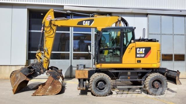 CAT M315F Pelle sur pneus