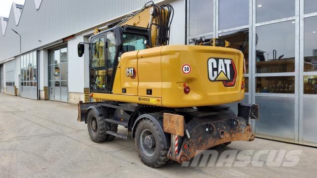 CAT M318-07E Pelle sur pneus