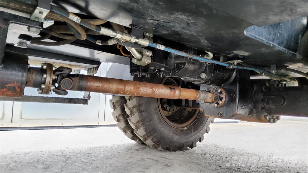 CAT M318-07E Pelle sur pneus