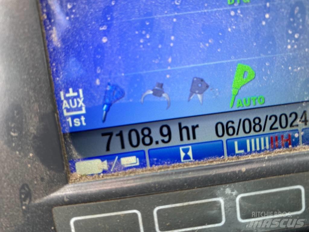 Takeuchi TB 295 W Pelle forestière