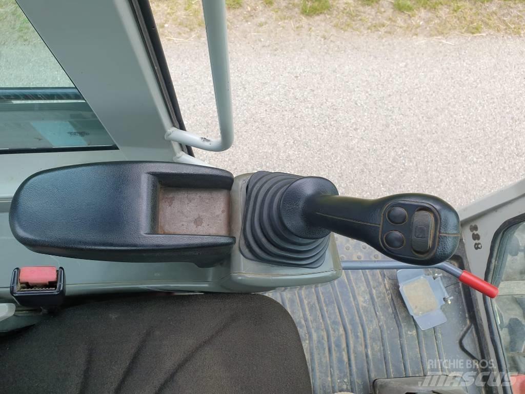 Takeuchi TB295W Pelle sur pneus