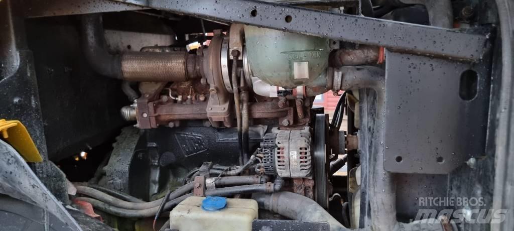 JCB 411 + 4 Chargeuse sur pneus