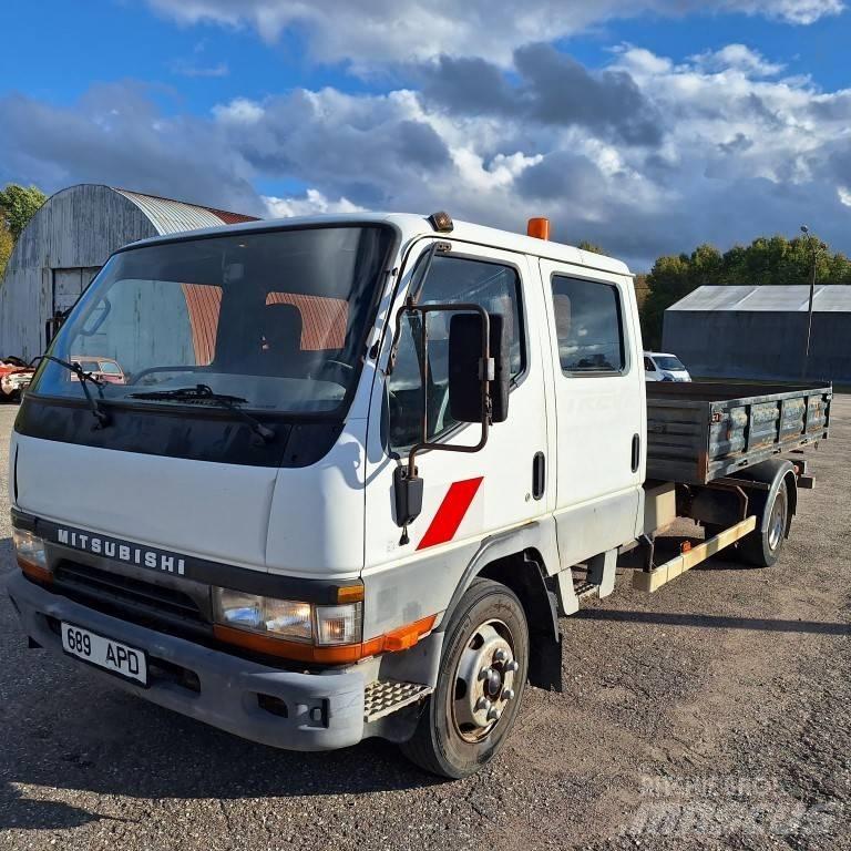 Mitsubishi Canter Camion plateau ridelle avec grue
