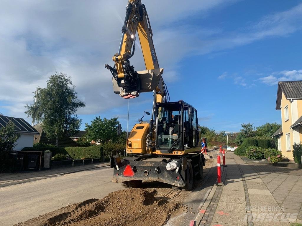 CAT M314 Pelle sur pneus