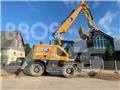 CAT M314 Pelle sur pneus