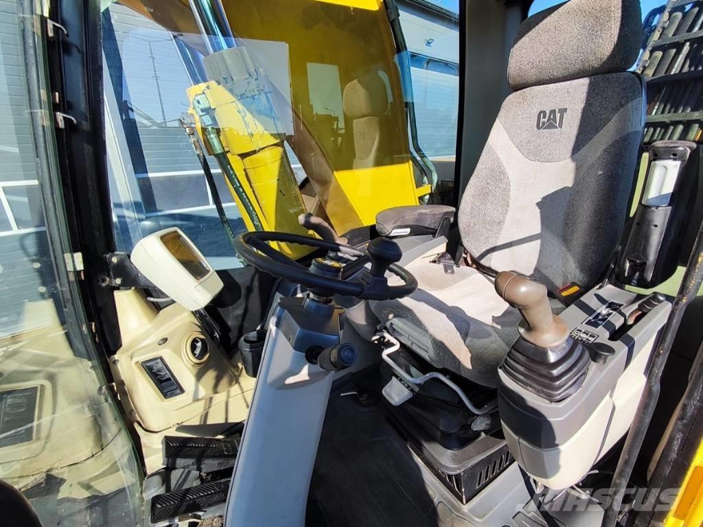 CAT M 318 C Pelle sur pneus