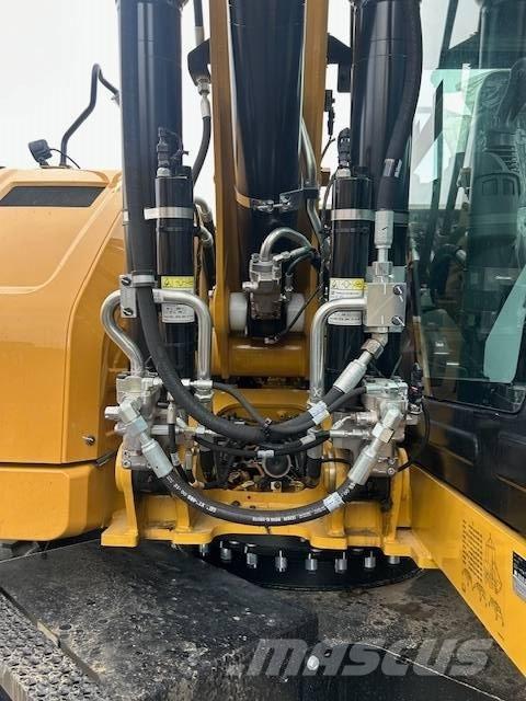 CAT M 316 Pelle sur pneus