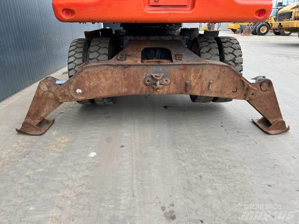 Doosan DX210W Pelle sur pneus