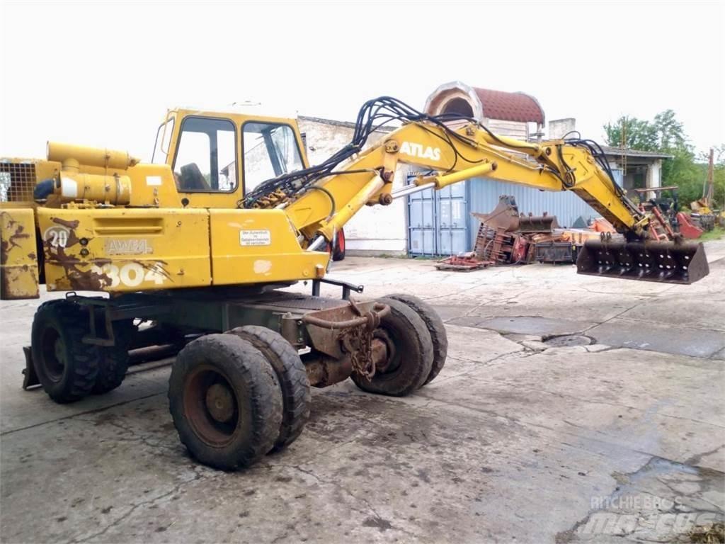 Atlas 1304 Pelle sur pneus