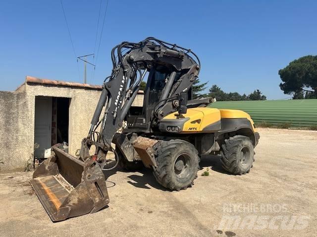 Mecalac 12 MTX Pelle sur pneus