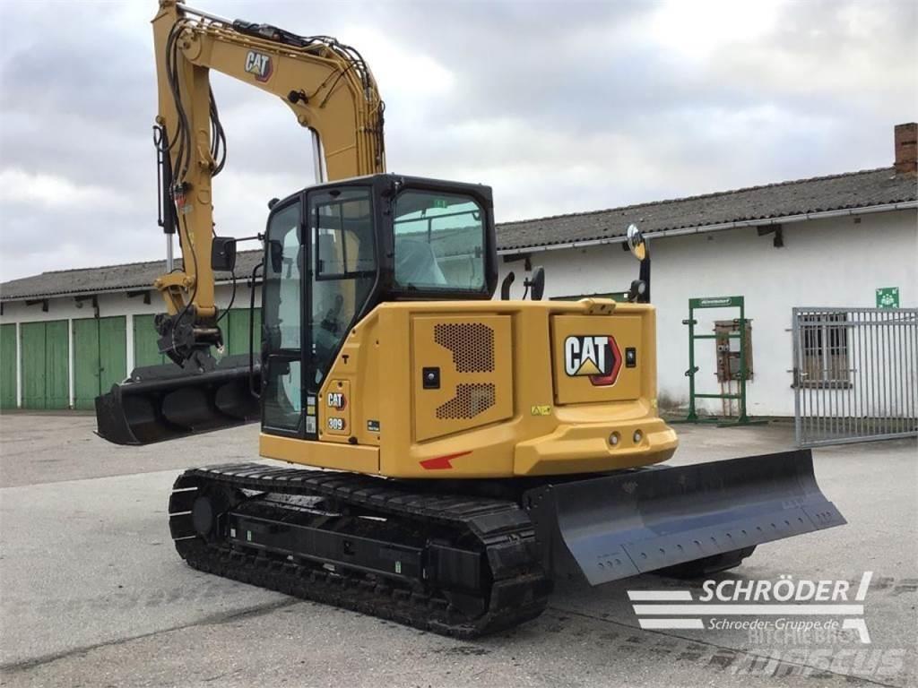 CAT 309 CR Pelle sur pneus