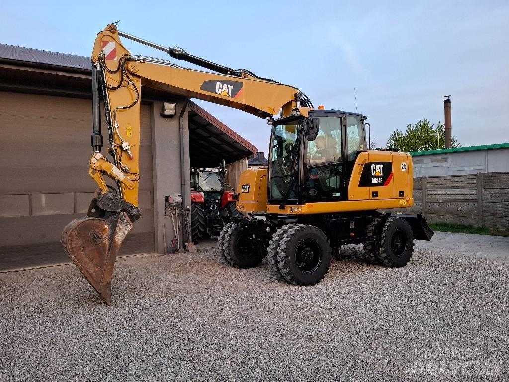 CAT 314 F Pelle sur pneus