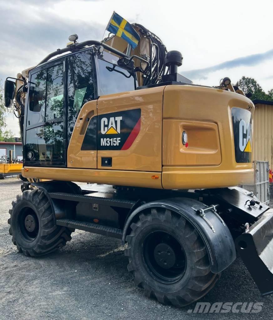 CAT 315 F Pelle sur pneus