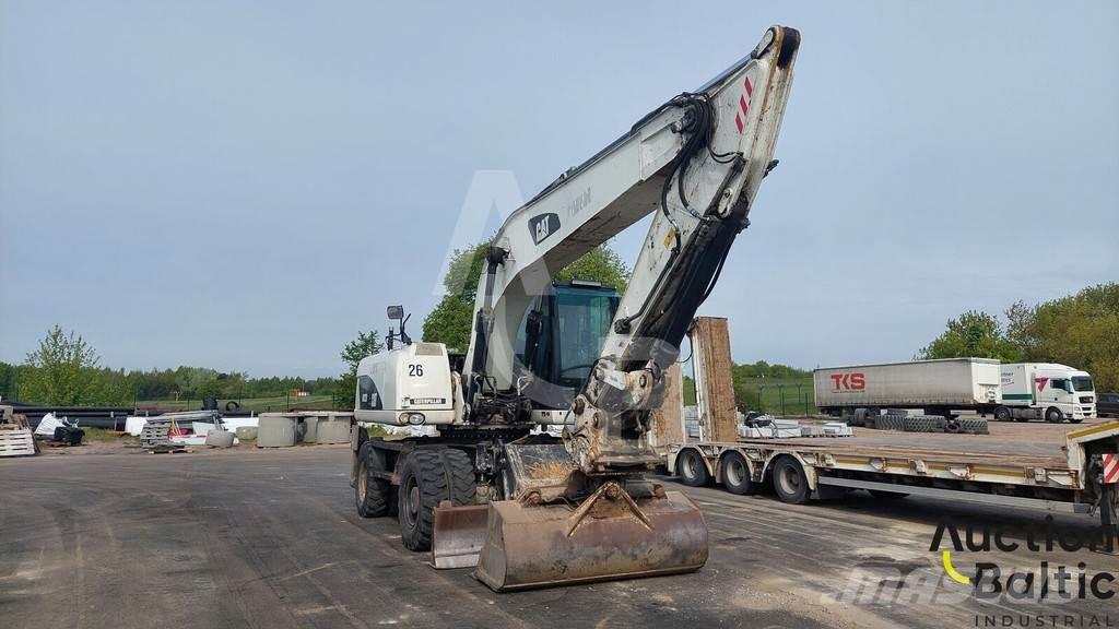 CAT M 322 D Pelle sur pneus
