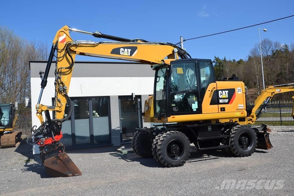 CAT M 315 F ROTOTILT Pelle sur pneus