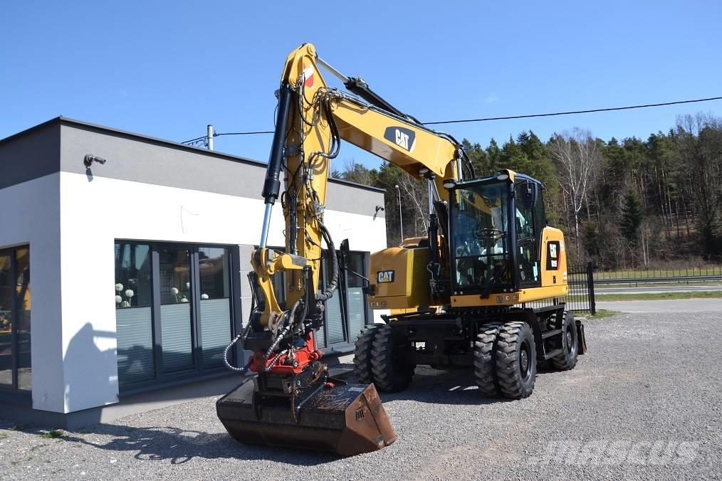 CAT M 315 F ROTOTILT Pelle sur pneus