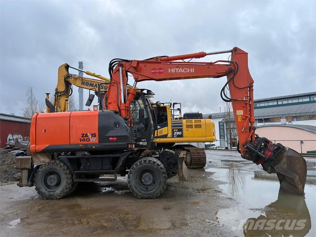 Hitachi ZX140W Pelle sur pneus