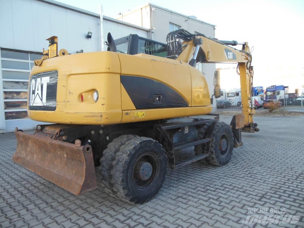 CAT M 316 D Pelle sur pneus