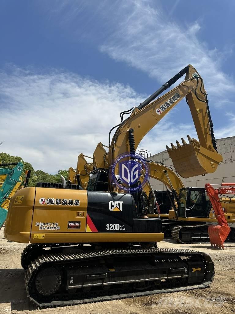 CAT CAT323 Pelle sur chenilles