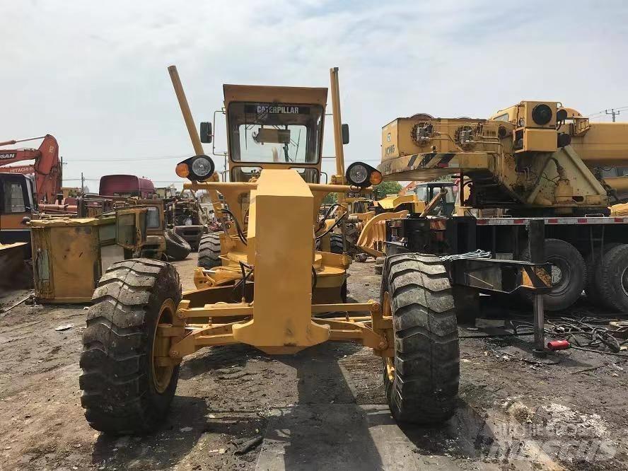 CAT 140 Niveleuse