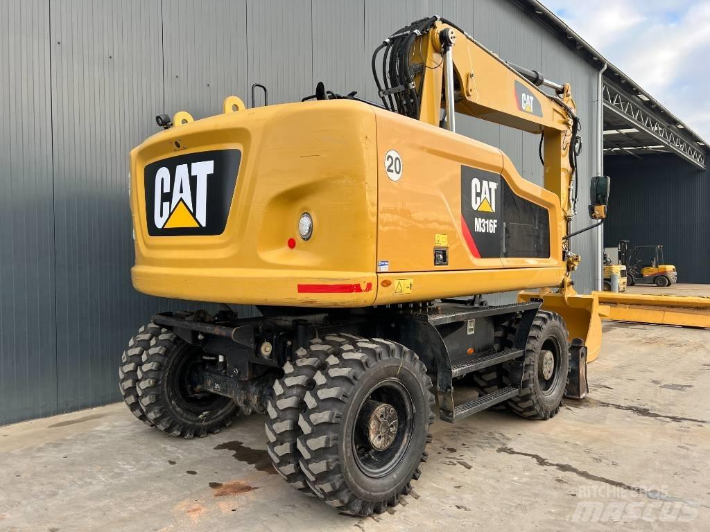 CAT M316F Pelle sur pneus