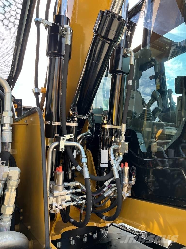 CAT M 315 F Pelle sur pneus