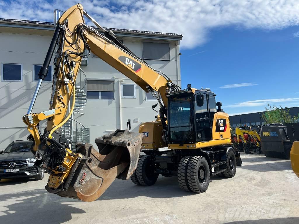 CAT M 315 F Pelle sur pneus