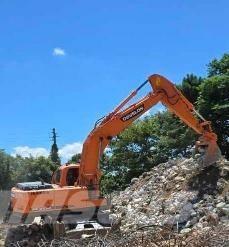 Doosan DX210WA Pelle sur pneus