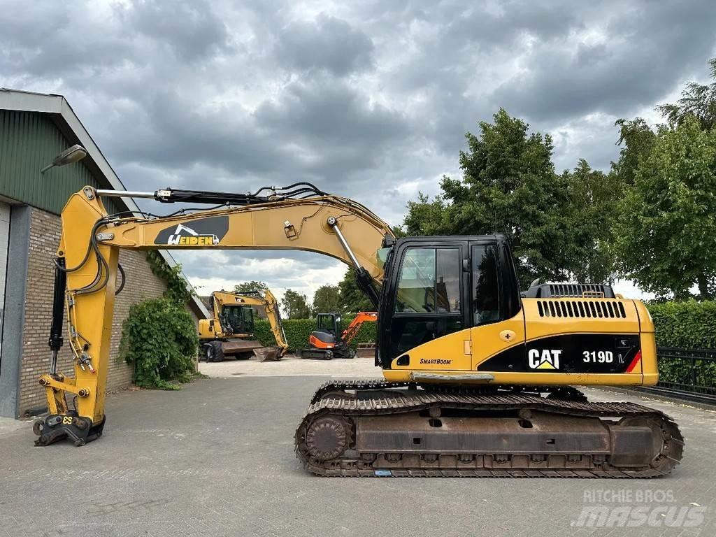 CAT 319D Pelle sur chenilles