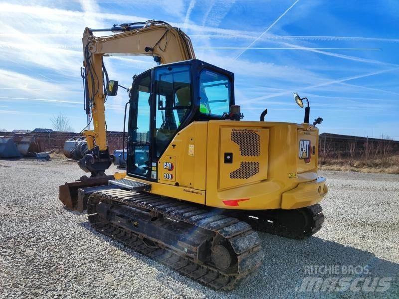 CAT 310-07A Pelle sur chenilles
