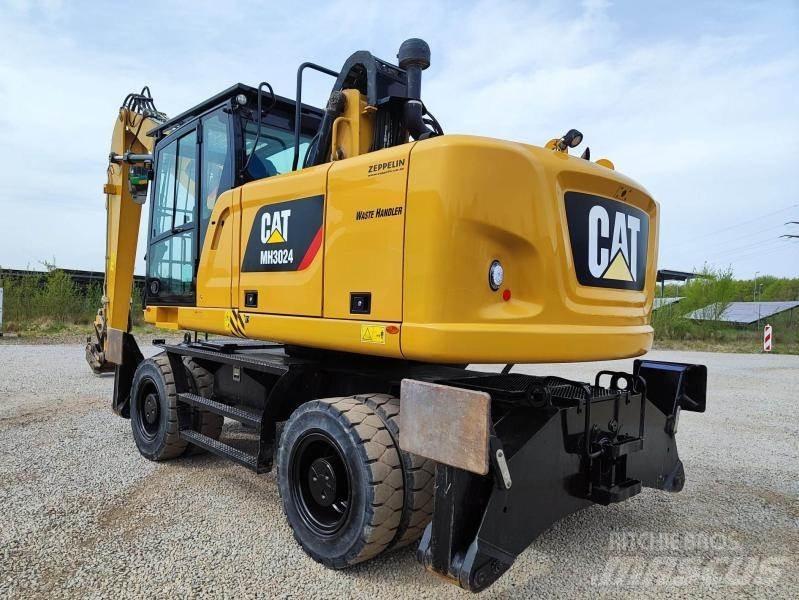 CAT MH3024 Pelle à déchets