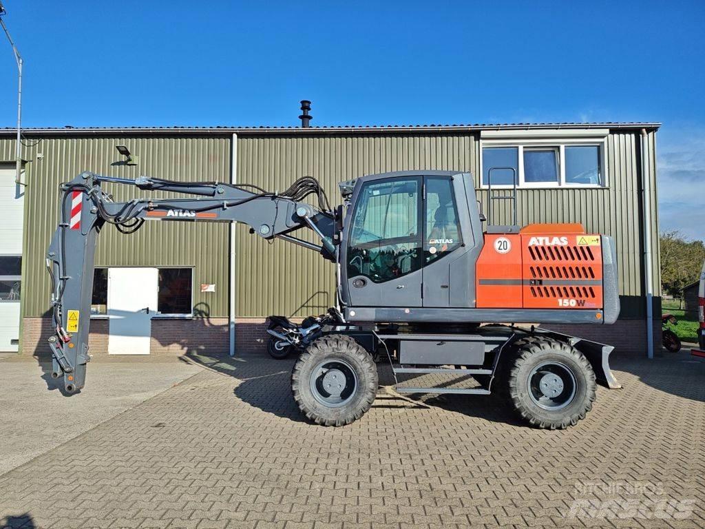 Atlas 150W Pelle sur pneus