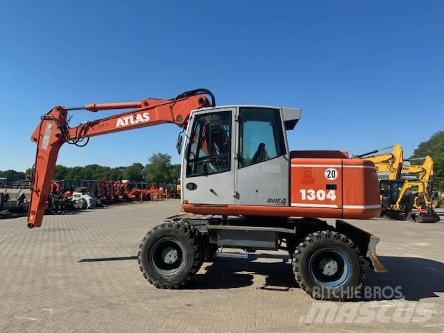 Atlas 1304 Pelle sur pneus